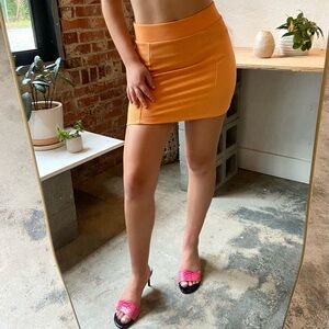 Vintage 60s style orange mini skirt